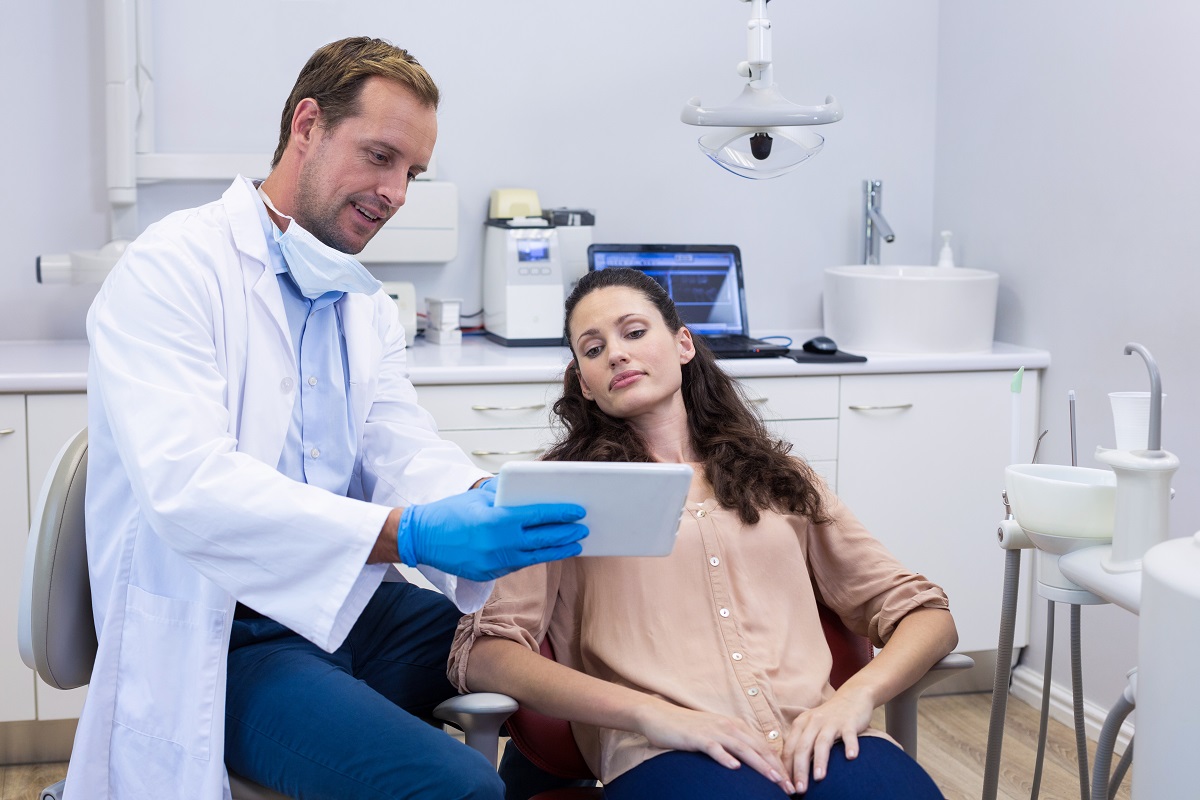 Dentist and female patient
