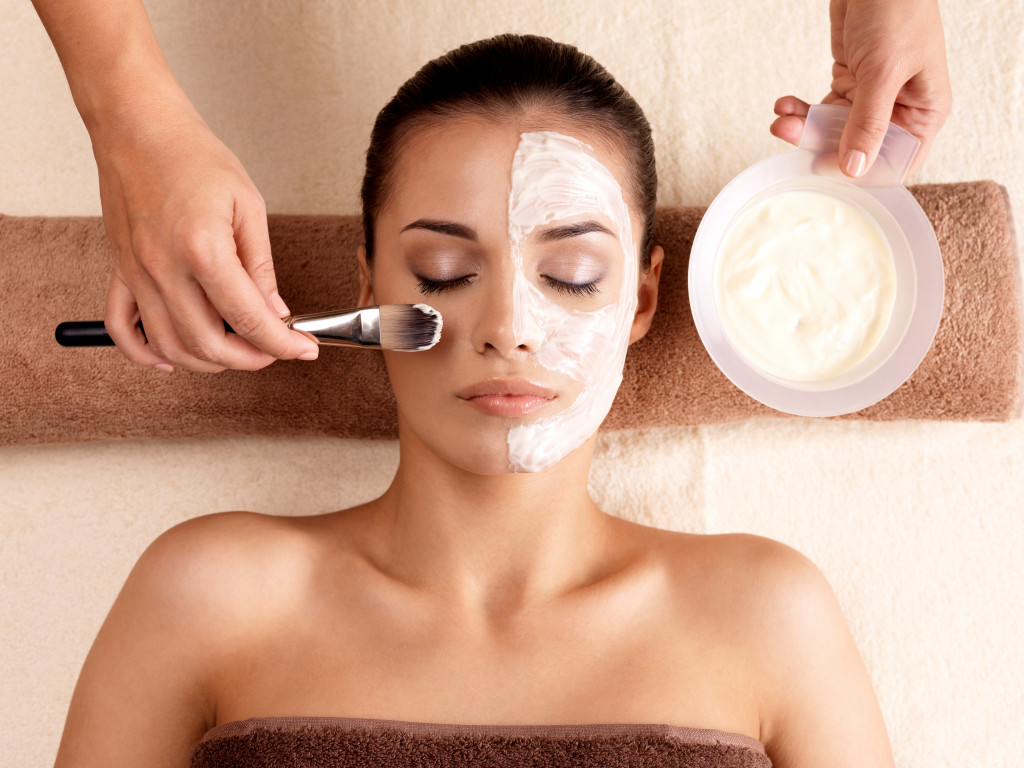 A facial cream application on a woman