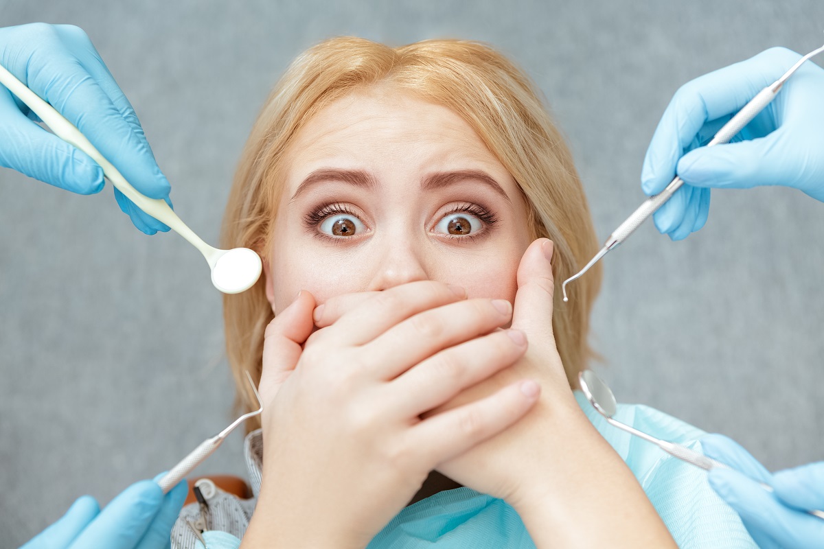 woman in fear of dentist